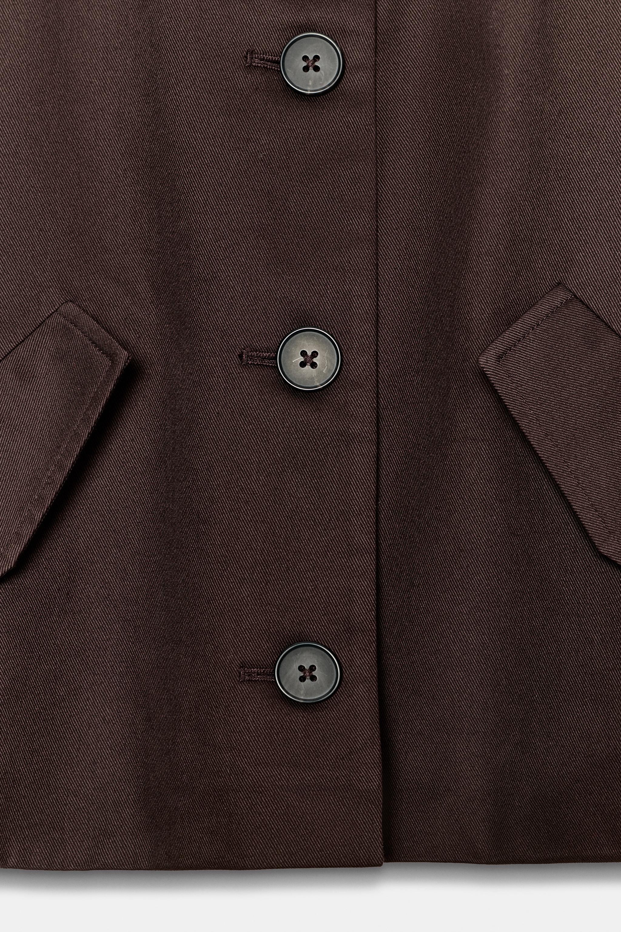 VESTE COURTE À REVERS